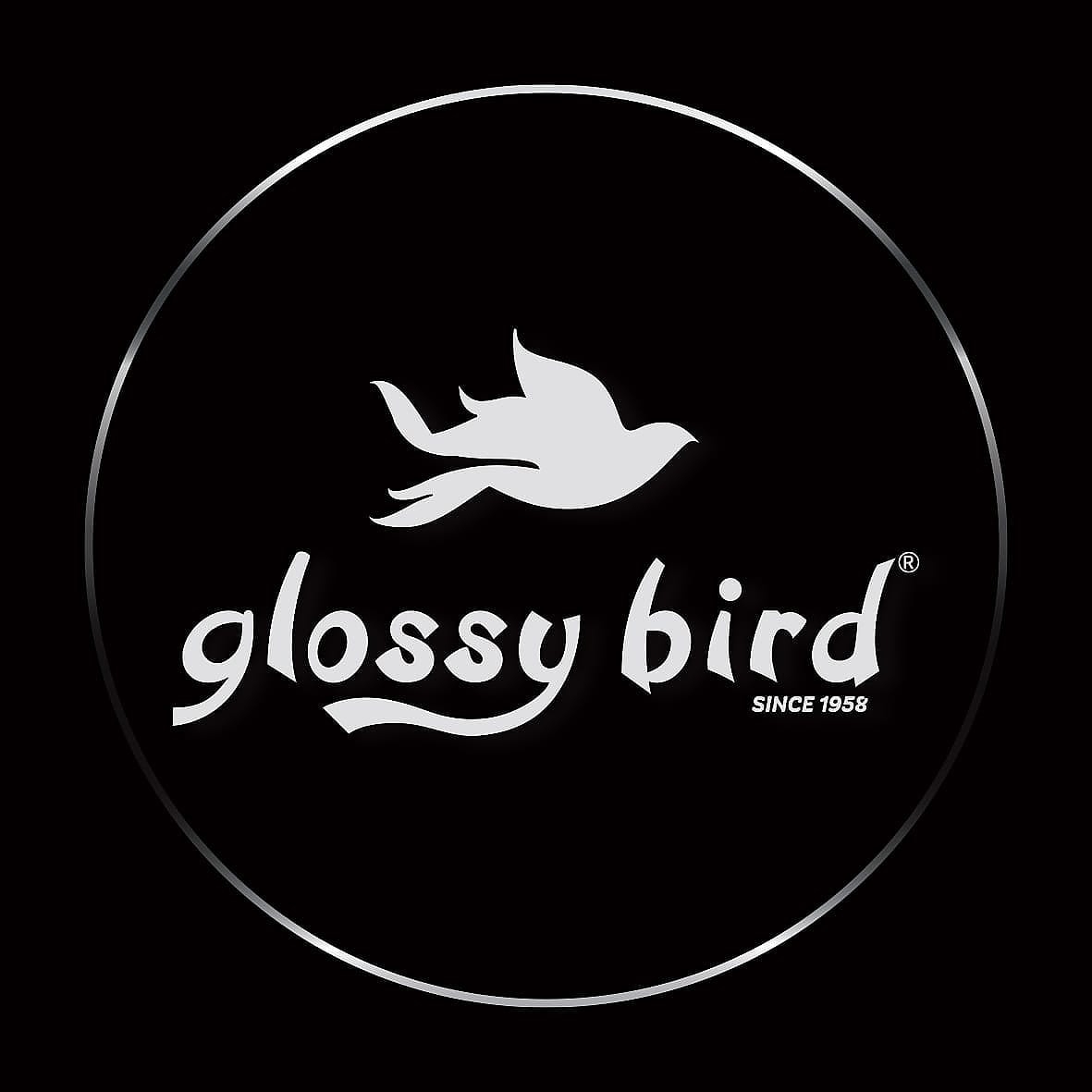 Glossy bird - Middle East Yellow Pages